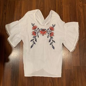 White embroidered open back top